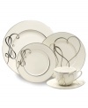 Sweet yet sophisticated, a loopy heart design sweeps across the porcelain Love Story 5-piece place settings from Mikasa. Complete with a sparkling platinum rim, this flirty ribbon pattern captivates everyone at your dinner table.