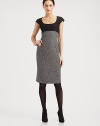Impeccably tailored from micro-patterned wool tweed, crowned with a solid scoopneck bodice.ScoopneckCap sleevesContrast bodiceCurved empire seamBack ventConcealed back zipFully linedAbout 26 from natural waist87% wool/12% polyamide/1% elastaneDry cleanMade in Italy of imported fabricModel shown is 5'10½ (177cm) wearing US size 4. 
