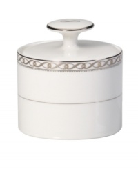 Endlessly elegant, Mikasa's Infinity Band sugar bowl features fine white porcelain trimmed with ribbons of platinum and dots. A single infinity symbol graces its lid. Endlessly elegant, Mikasa's Infinity Band sugar bowl features fine white porcelain trimmed with ribbons of platinum and dots. A single infinity symbol graces its lid.