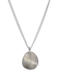 Whisk yourself away to the seashore at any time. Kenneth Cole New York's shimmery, summery style feature an oval-cut shell pendant set in silver tone mixed metal. Approximate length: 18 inches + 3-inch extender. Approximate drop: 1-3/4 inches.