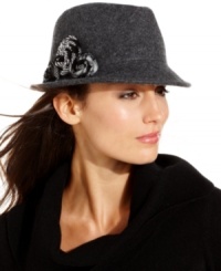 Reminiscent of the silver screen divas from the '40s, this fedora design from Nine West speaks classic style. Soft wool felt is topped off with a romantic floral accent, for a look that's altogether alluring. Reminiscent of the silver screen divas from the '40s, this fedora design from Nine West speaks classic style. Soft wool felt is topped off with a romantic floral accent, for a look that's altogether alluring.