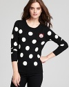 A lively shower of classic white polka dots and a curious little cat print are the fun, retro-inspired details that add color and a touch of whimsy to this eye-catching French Connection sweater.