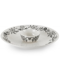 Oleg Cassini weaves a table of playful sophistication with the Ava chip and dip, featuring lacy flowers and dots embossed and hand painted in black and white. Oleg Cassini weaves a table of playful sophistication with the Ava chip and dip, featuring lacy flowers and dots embossed and hand painted in black and white.