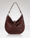 Equal parts lived-in and luxe, this leather hobo from Frye encapsulates the heritage brand's boundless, boho aesthetic.