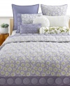 Sumptuous quilting with detailed circle embroidery lends a warm accent to the Sakura bedding from Style&co. A reverse solid purple design enhances the collection with soothing color. (Clearance)