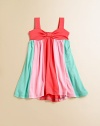 A trendy colorblock detail and bow-front bodice make this empire-waist frock anything but ordinary.Sweetheart necklineWide strapPullover style with back smockingEmpire waistFull skirt95% rayon/5% spandexHand washMade in USA