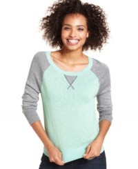 Make room in your closet for a raglan unlike any other! Sporting brilliant metallic sleeves, NYC Knitwear's colorblock sweater adds pizzazz to a laid-back look. Make room in your closet for a raglan unlike any other! Sporting brilliant metallic sleeves, NYC Knitwear's colorblock sweater adds pizzazz to a laid-back look.