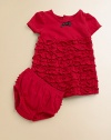 Your beautiful baby will standout in this classic cotton frock with a flurry of ruffles and matching bloomers.CrewneckShort sleevesBack buttonsHigh-waistedRuffled skirtCottonMachine washImported Please note: Number of buttons may vary depending on size ordered. 