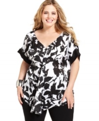 Featuring a gathered front, J Jones New York's short sleeve plus size top is a flattering addition to your wardrobe. Featuring a gathered front, J Jones New York's short sleeve plus size top is a flattering addition to your wardrobe.