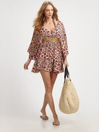 A dramatic style with kimono sleeves, beaded waistline and a tie plunge v-back. V-neckThree-quarter length kimono sleevesTie v-backBeaded empire waistGathered skirtRayonDry cleanImported A dramatic style with kimono sleeves, beaded waistline and a tie plunge v-back. V-neckThree-quarter length kimono sleevesTie v-backBeaded empire waistGathered skirtRayonDry cleanImported
