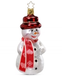 Dressed for the occasion! This Inge-Glas snowman is all decked out with a red hat and coordinating scarf, making him the coolest ornament on your Christmas tree. Mouth-blown and hand-painted. Dressed for the occasion! This Inge-Glas snowman is all decked out with a red hat and coordinating scarf, making him the coolest ornament on your Christmas tree. Mouth-blown and hand-painted.