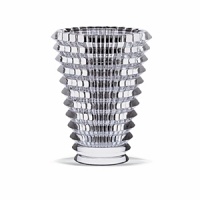 The synchronously patterned and multi-faceted cut of the Eye vase creates a dynamic visual texture that truly accentuates Baccarat crystal's superior ability to capture the magic of light. The synchronously patterned and multi-faceted cut of the Eye vase creates a dynamic visual texture that truly accentuates Baccarat crystal's superior ability to capture the magic of light.