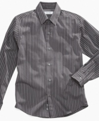 Keep it fresh. This Calvin Klein button-up shirt puts a cool look within reach in his closet. Keep it fresh. This Calvin Klein button-up shirt puts a cool look within reach in his closet.
