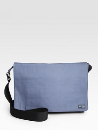 Classic flap messenger silhouette, with interior functionality including headphone button-hole, laptop compartment and pen pockets.Flap, velcro closureAdjustable shoulder strapInterior zip pocketNylon14W x 11H x 6DImported Classic flap messenger silhouette, with interior functionality including headphone button-hole, laptop compartment and pen pockets.Flap, velcro closureAdjustable shoulder strapInterior zip pocketNylon14W x 11H x 6DImported