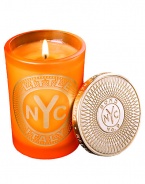 From a uniquely New York collection of scents, this unisex scented candle celebrates the lively charm of Little Italy.  · Blend of mandarin, sweet tangerine, Clementine and musk  · Made of the finest wax and wicks  · In sturdy, tinted glass container  · Gilt metal cap keeps scent from fading 