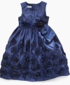 She'll look as precious as a flower in this beautiful rosette dress by Bonnie Jean.