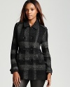 Proving tweed and plaid are still chic, this of-the-moment Burberry London coat wows on the weekend in a tailored silhouette rendered in a warm wool blend.
