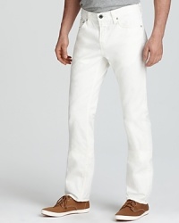 Brilliantly white, these J Brand Kane jeans exude warm weather style and feature a slim, straight leg for modern appeal. Brilliantly white, these J Brand Kane jeans exude warm weather style and feature a slim, straight leg for modern appeal.