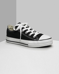 Low cut Converse All Stars. This classic canvas sneaker set the standard in cool and comfort. Available in infant sizes. With lace-up canvas uppers, contrast stitching and rubber sole and toe. Low cut Converse All Stars. This classic canvas sneaker set the standard in cool and comfort. Available in infant sizes. With lace-up canvas uppers, contrast stitching and rubber sole and toe.