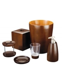 Give your bath a sleek, natural look with the Boomba toothbrush holder, featuring smooth bamboo wood for sophistication with a decidedly exotic appeal. Give your bath a sleek, natural look with the Boomba toothbrush holder, featuring smooth bamboo wood for sophistication with a decidedly exotic appeal.