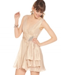 Simply gorgeous, this fair-colored dress from Speechless features a wide sash, metallic sheen and rhinestone brooch for a hint of glamour. Simply gorgeous, this fair-colored dress from Speechless features a wide sash, metallic sheen and rhinestone brooch for a hint of glamour.