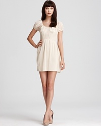 Delight in this season's flair for the romantic with this Juicy Couture dress. Intricate florals bloom against a creamy silhouette for a style that will seduce us all. Delight in this season's flair for the romantic with this Juicy Couture dress. Intricate florals bloom against a creamy silhouette for a style that will seduce us all.