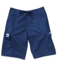 Style stays simple with these Quiksilver board shorts so the only things that stand out are his swimming skills. Style stays simple with these Quiksilver board shorts so the only things that stand out are his swimming skills.