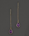 A graceful single drop earring rendered with blushing amethyst on yellow gold.