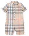 Utterly classic, this Burberry shortall boasts the brand's signature check print in a pale palette and crisp cotton.