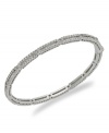 Don't set your fashion in stone. Evolve with Eliot Danori's elegant bangle bracelet, featuring a bezel setting with crystal glass accents. Crafted in rhodium-plated mixed metal. Approximate diameter: 2-1/4 inches.
