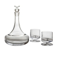 This graceful decanter is made of solid, sparkling full-lead Nambé Crystal, mouth-blown and hand-cut in the traditional manner by the finest European glassblowers according to a 300-year-old process. With two double old fashioned glasses, this decanter set makes a perfect gift.