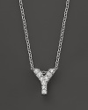 From the Tiny Treasures collection, a diamond Y necklace. With signature ruby accent. Designed by Roberto Coin.