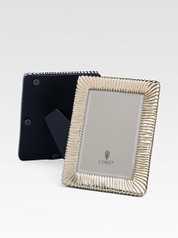 A keepsake accent for life's favorite moments and people in satin-finished goldplate with pleated texture and beveled glass. Arrives in a gift box ImportedDIMENSION INFORMATION4 X 6 (6 X 8 overall)5 X 7 (7 X 9 overall) A keepsake accent for life's favorite moments and people in satin-finished goldplate with pleated texture and beveled glass. Arrives in a gift box ImportedDIMENSION INFORMATION4 X 6 (6 X 8 overall)5 X 7 (7 X 9 overall)