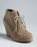 Lace into the bootie trend in DV Dolce Vita's platform wedges.