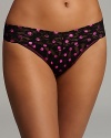 Hanky Panky gives retro polka dots a modern, metallic upgrade with this original-rise lace thong. Style #8S1186.