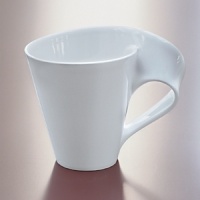 Wake up in style with this designer coffee series from Villeroy & Boch. These stylish mugs look like works of modern art, but are actually functional pieces that make getting up in the morning just a little more worth while. Complete with matching party plate-sized to hold a small treat. This cool collection is perfect for morning, noon or night. Microwave and dishwasher safe. Wake up in style with this designer coffee series from Villeroy & Boch. These stylish mugs look like works of modern art, but are actually functional pieces that make getting up in the morning just a little more worth while. Complete with matching party plate-sized to hold a small treat. This cool collection is perfect for morning, noon or night. Microwave and dishwasher safe.