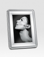 Elegantly appointed, polished silverplated design gives proper attention to a favorite photograph. From the Malmaison Collection A terrific gift idea Wood base Made in FranceDIMENSION INFORMATION4 X 6 (5 X 7 overall)5 X 7 (6 X 8 overall)