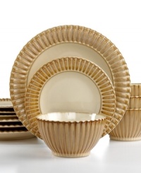 Rustic yet refined, the Terre Monte dinnerware set from Gibson includes four place settings finished with a reactive glaze and dramatic fluted texture. Natural amber tones foster serene everyday meals. Rustic yet refined, the Terre Monte dinnerware set from Gibson includes four place settings finished with a reactive glaze and dramatic fluted texture. Natural amber tones foster serene everyday meals.