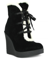 With a contrasting faux-shearling lining and a smooth suede upper, Mia's Glenda platform wedge booties are as warm as they look. With a contrasting faux-shearling lining and a smooth suede upper, Mia's Glenda platform wedge booties are as warm as they look.