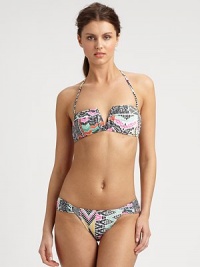 A vibrant print and classic bikini silhouette combine to create an alluring design, including a removable halter strap for style versatility. Removable halter strapBandeau topBack clasp closureSexy, ruched sides on stretch bottomFully lined80% nylon/20% spandexHand washMade in USA