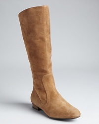 Suede lends a luxe touch and dressed-up wardrobe possibilities to flat riding boots; from Via Spiga.