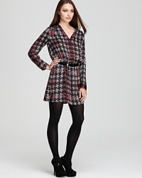 Spiked with rich color and artfully embellished, classic houndstooth gets an edgy update atop a DKNYC shirt dress for a polished silhouette with a touch of punk of edge. Spiked with rich color and artfully embellished, classic houndstooth gets an edgy update atop a DKNYC shirt dress for a polished silhouette with a touch of punk of edge.