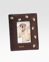 Handcrafted of French goatskin with a golden trail of paw prints, it's an ideal display for the four-legged love of your life. Holds 2¾ X 3¾ photo Made in USAFOR PERSONALIZATIONSelect a color and quantity, then scroll down and click on PERSONALIZE & ADD TO BAG to choose and preview your monogramming options. Please allow 1 week for delivery.