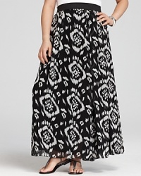 Enliven your wardrobe with this VINCE CAMUTO maxi skirt, flaunting an exotic ikat print and easy pull-on silhouette. Enliven your wardrobe with this VINCE CAMUTO maxi skirt, flaunting an exotic ikat print and easy pull-on silhouette.