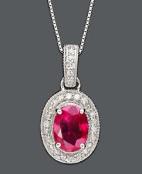 Keep this stunning king of gemstones close to your heart. Oval-cut ruby (1-1/2 ct. t.w.) pendant in 14k white gold setting encrusted with round-cut diamond (1/5 ct. t.w.). Approximate length: 18 inches. Approximate drop: 7/8 inch.