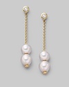 From the Pearls in Motion Collection. Delicate chains of 18k gold dangle from diamond studs and hold white Akoya pearls that slide up and down but stay where you place them. 7mm white round cultured pearls Quality: A+ Diamonds, 0.14 tcw 18k yellow gold Drop, about 1¾ Post back Imported