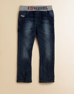 A comfy pair with slight fading, light whiskers and bold letters at the waist.Elastic waistbandFive-pocket style with stitching on back pockets69% cotton/29% polyester/2% elastaneMachine washImported