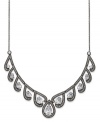 An alluring frontal necklace from Eliot Danori. Sparkling crystals and clear cubic zirconias (7-5/8 ct. t.w.) combine to present an enchanting appearance. Set in hematite tone brass. Approximate length: 16 inches + 2-inch extender. Approximate drop: 3/4 inches.