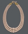 Add pick-me-up to your look with perfect pastels. This three-row graduated necklace by Charter Club features pink simulated plastic pearls in a mixed metal setting. Approximate length: 15 inches + 2-inch extender.