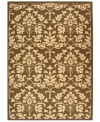Safavieh takes classic beauty outside of the home with this elegant rug, created with a specially designed sisal weave. In deep chocolate brown with natural accents, this beautiful piece makes the most of any outdoor patio, porch or balcony. (Clearance)